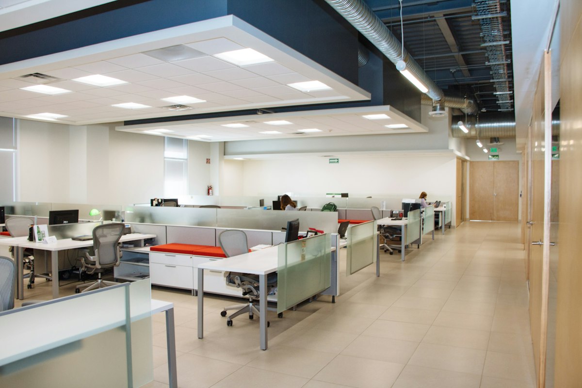 Bright, clean open-plan office with tidy desks